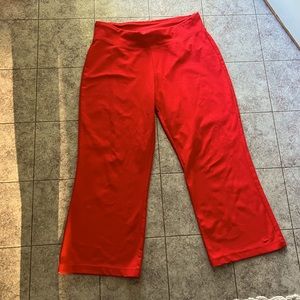 Bright reddish coral Nike dri fit capris size Med